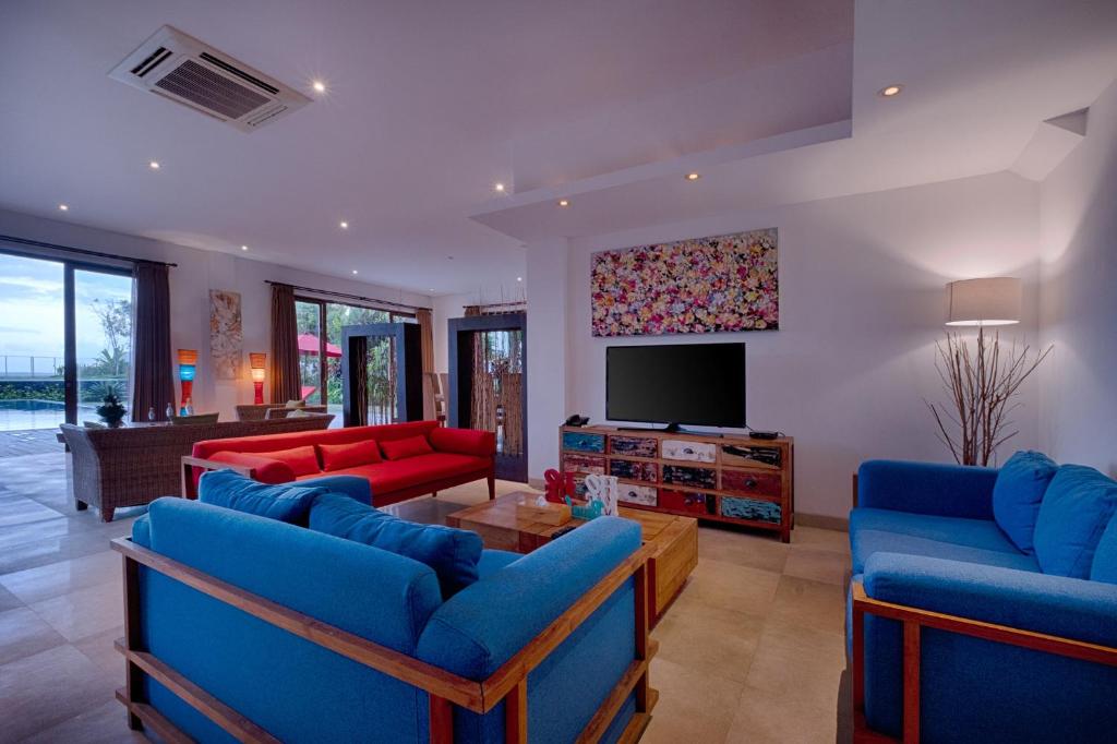 living room blue sofa kutus villa