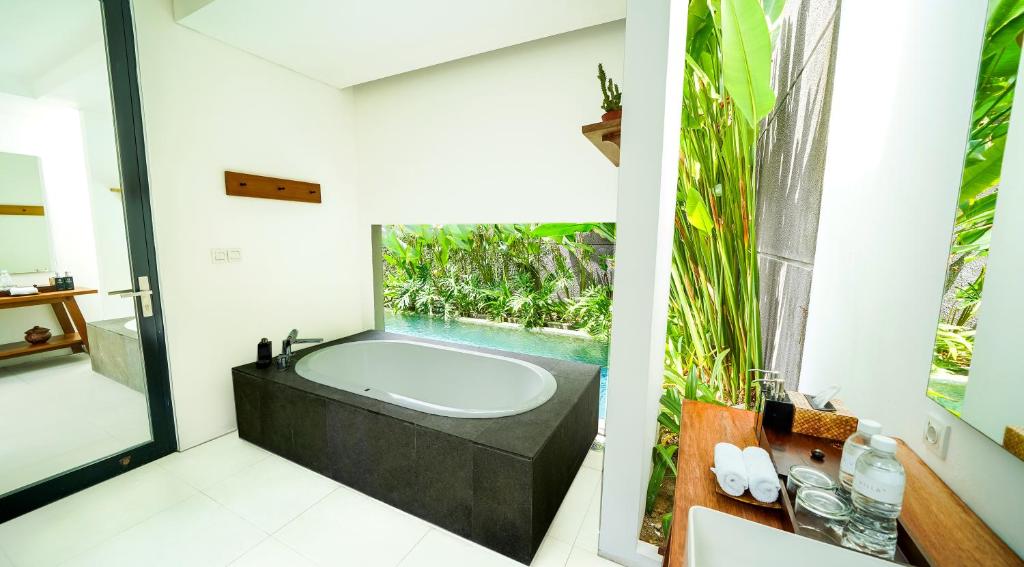 Private pool with towel at Abia Villas