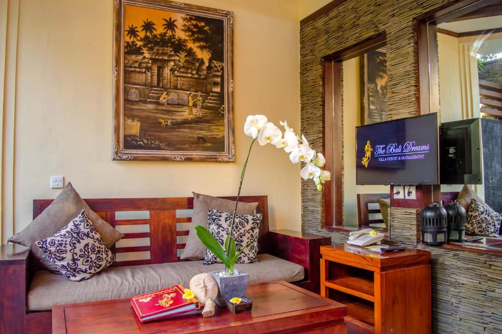 Sofa with TV at The Bali Dream  