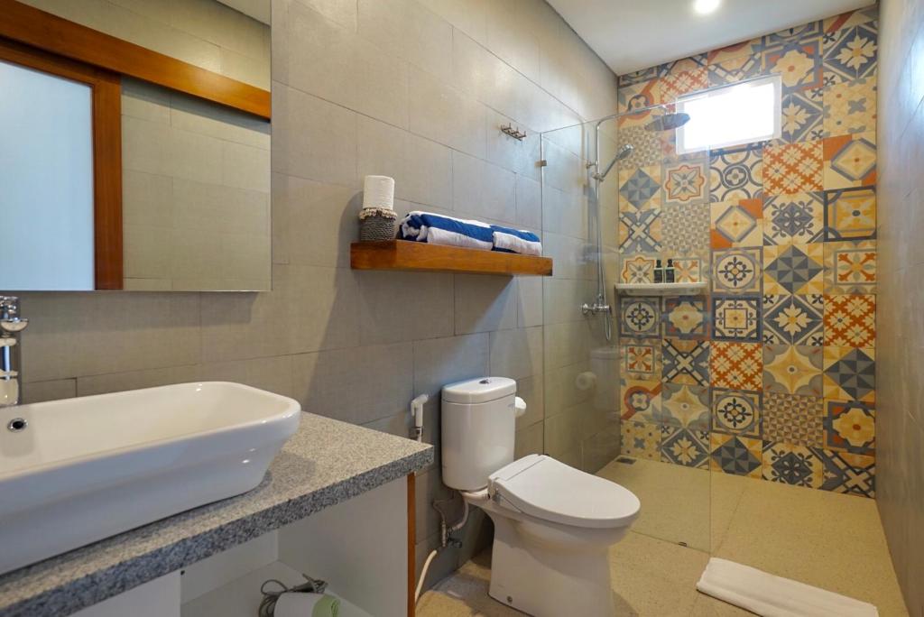 Bathroom with shower at Belle Astina Villas