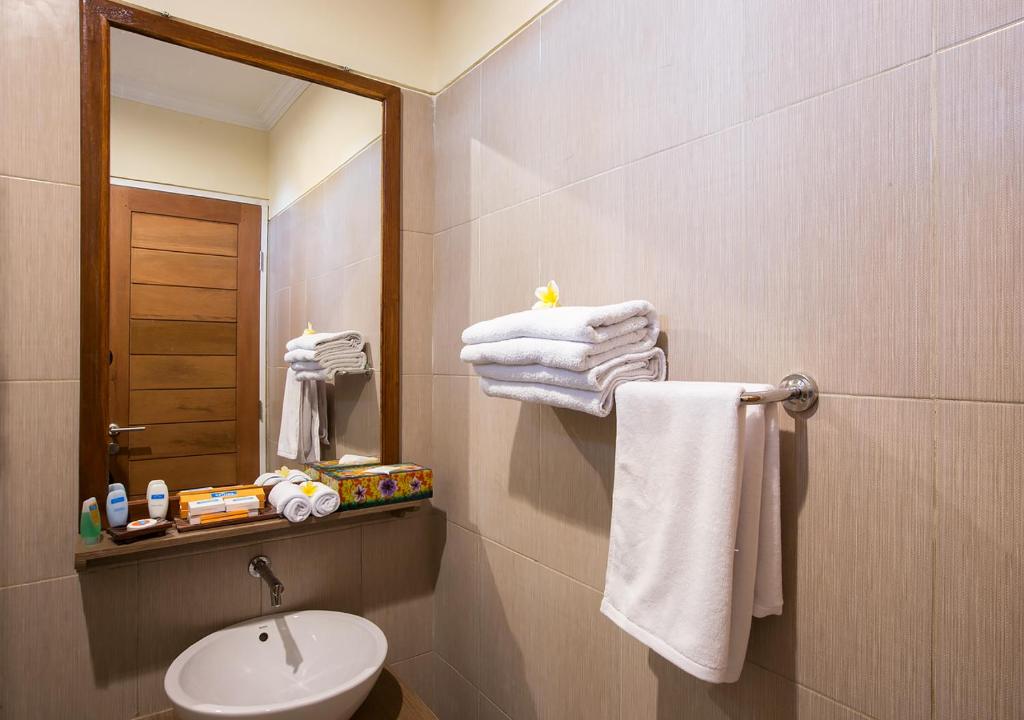 Wash room with Towel at Destiny Villas