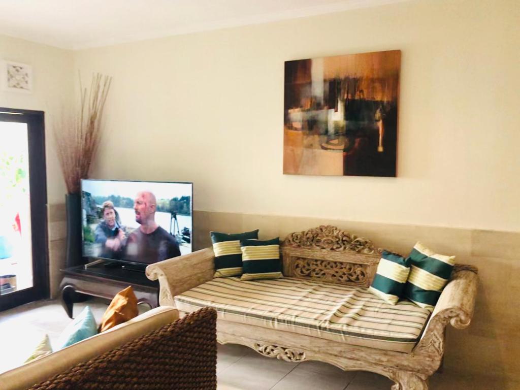 Sofa with TV at Dream villa Seminyak