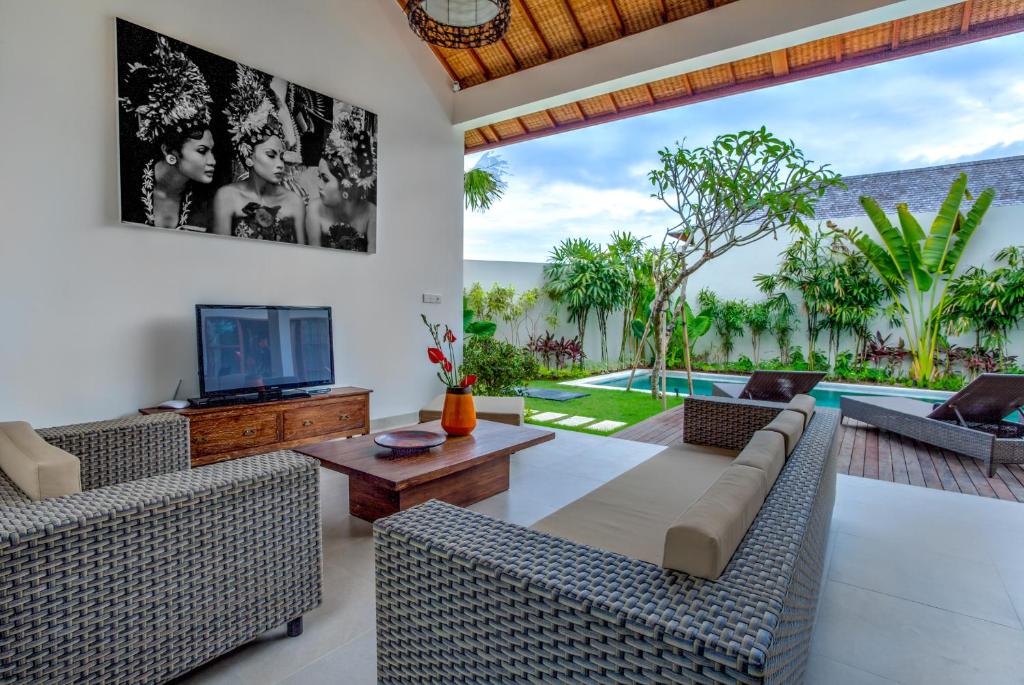 Sofa with TV at Bracha Villas Bali