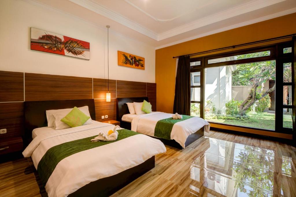 Twin bed at Gracia Bali Villas 
