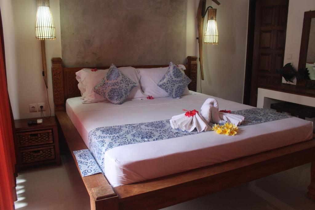 Bedroom with AC at Jukung Villas 