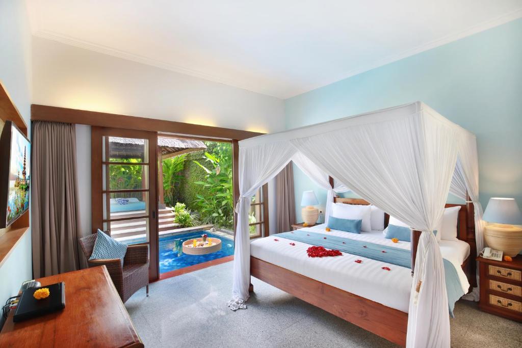 Bedroom with pool at Kecapi Villa