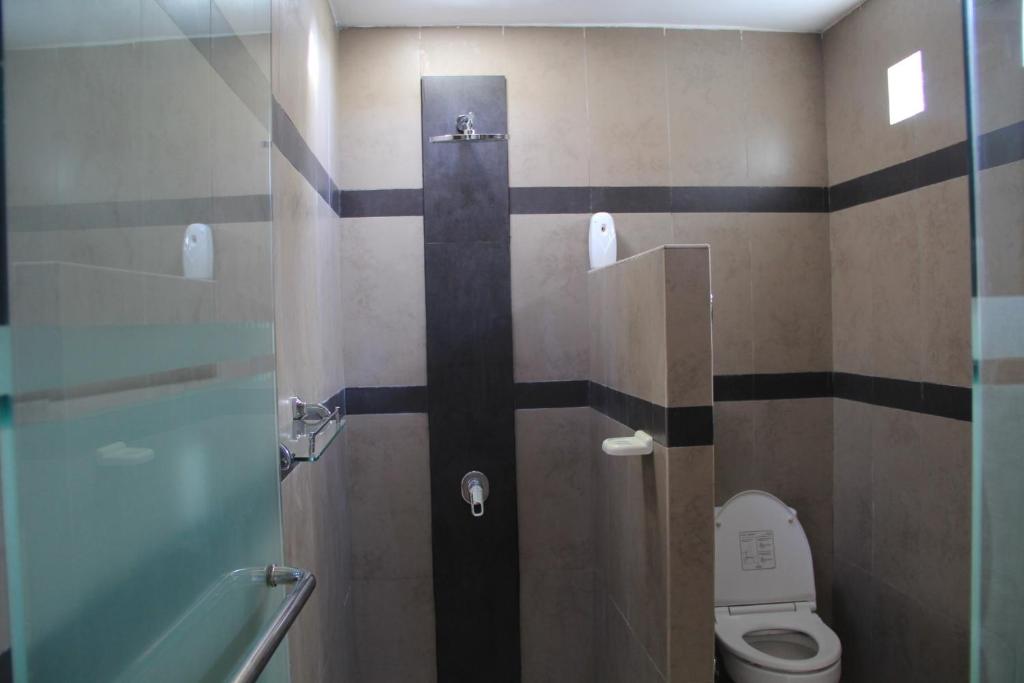 Bathroom with shower at Ketut Villa Sanur