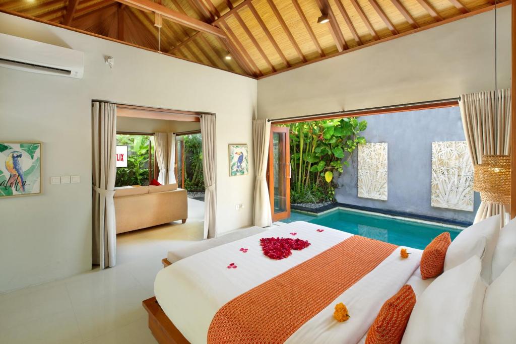 Bedroom with pool at Beautiful Bali Villas
