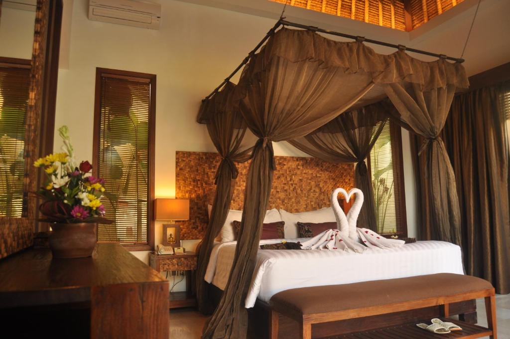 Bedroom at Mahagiri Villas & Spa Dreamland