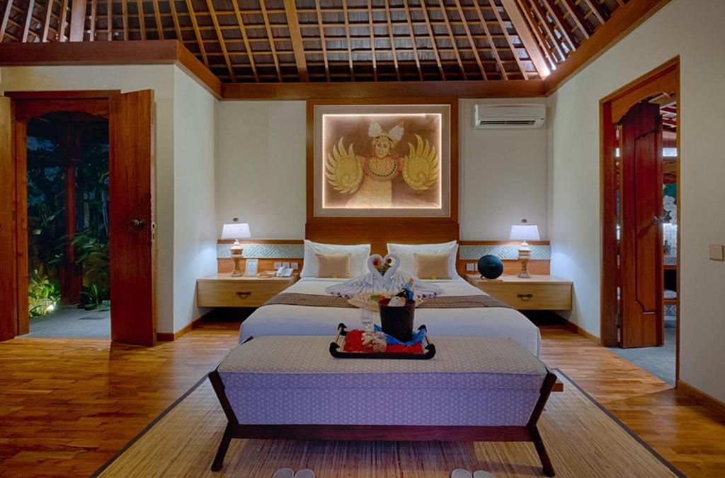 Bedroom with AC at Nau Villa Ubud