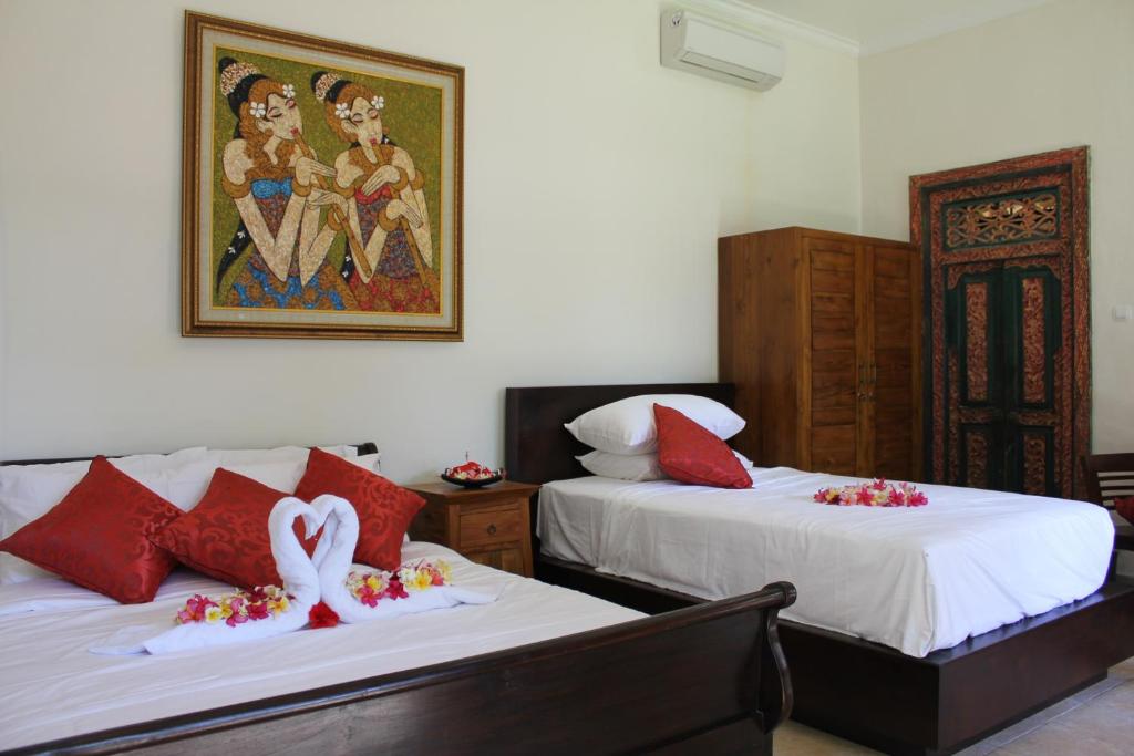 Twin bed at The Ning Beach Front Villa