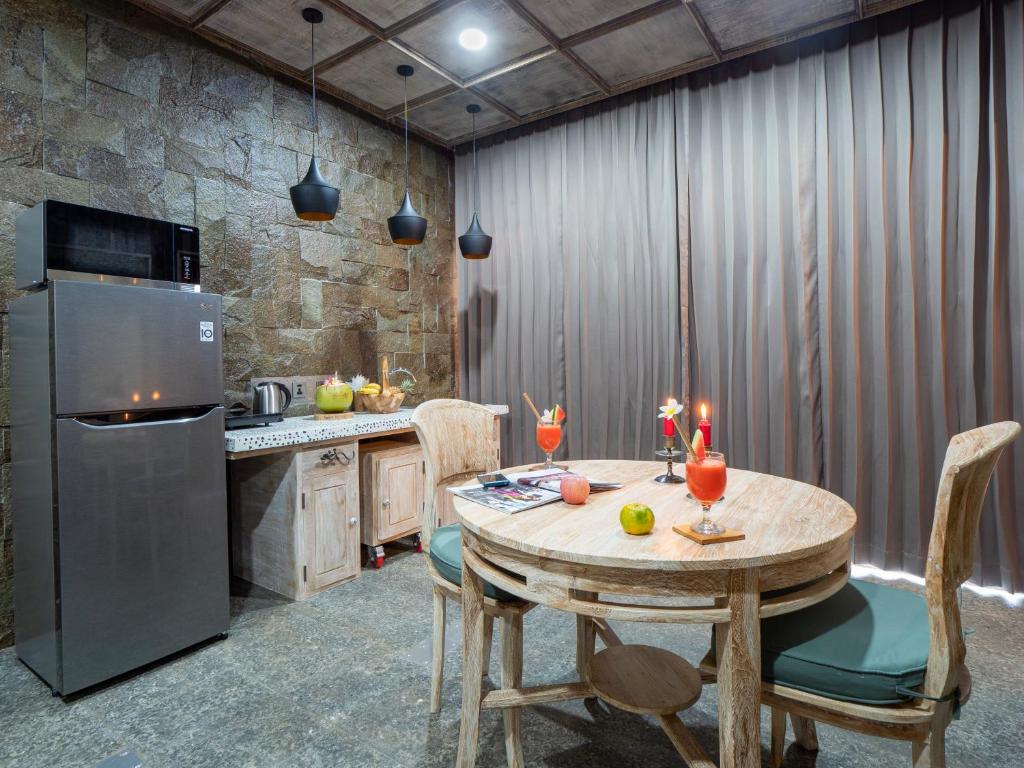 Fridge with table at Octopus Villas