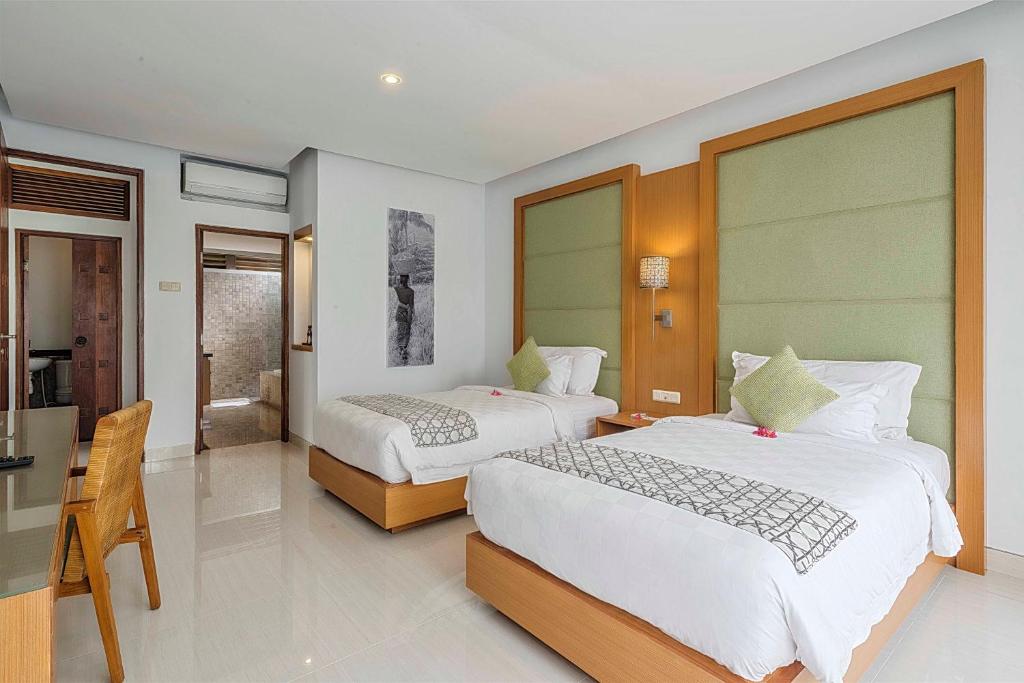 Twin bed with AC at Maylie Bali Villa
