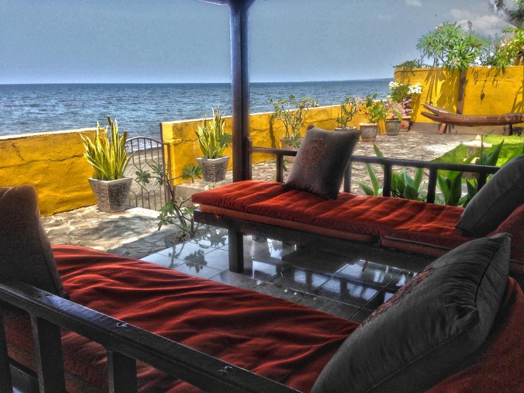 Sun loungers or beach chairs at Puri Jati Retreat