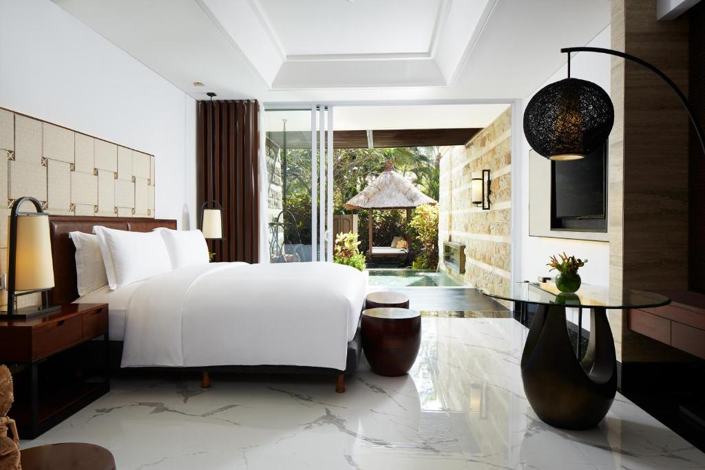 Bedroom with Garden view at Suites & Villas 
