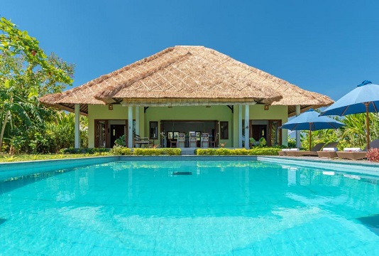 Exterior view of a swimming pool at North Cape villa in Bali