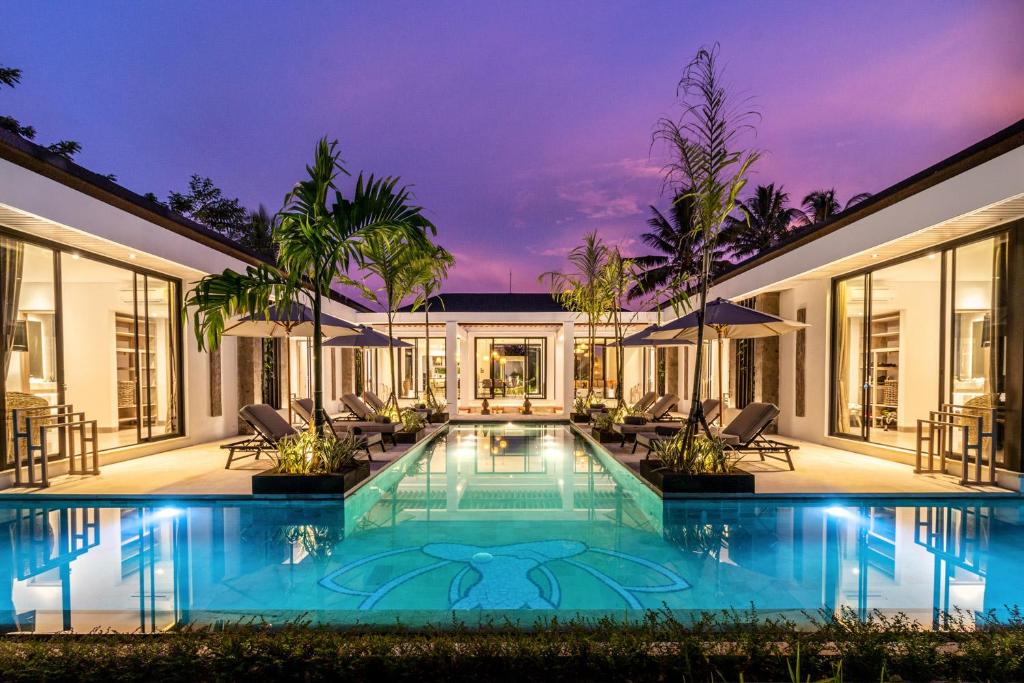 Exterior night view of a private pool at Dream Meditation Large Villas in Bali