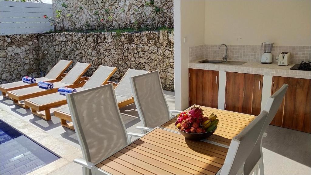 Sun loungers or beach chairs at Villa Panoramic