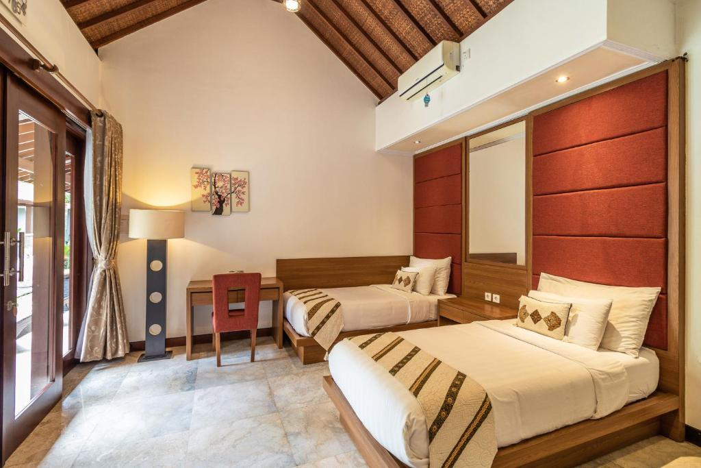 Twin bed with AC at Villa Purnama