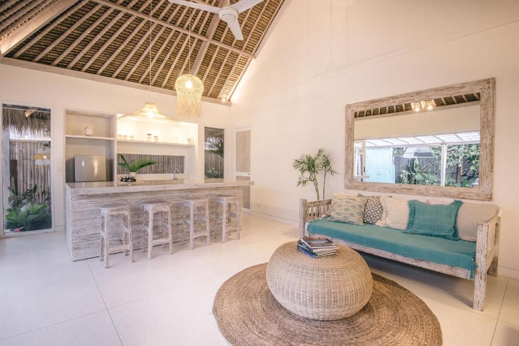 Living hall with sofa at Villa Santai at Sandy Bay