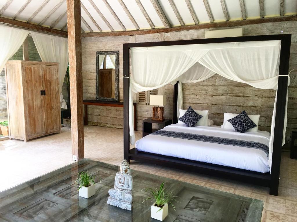 Bedroom with AC at Villa Santai