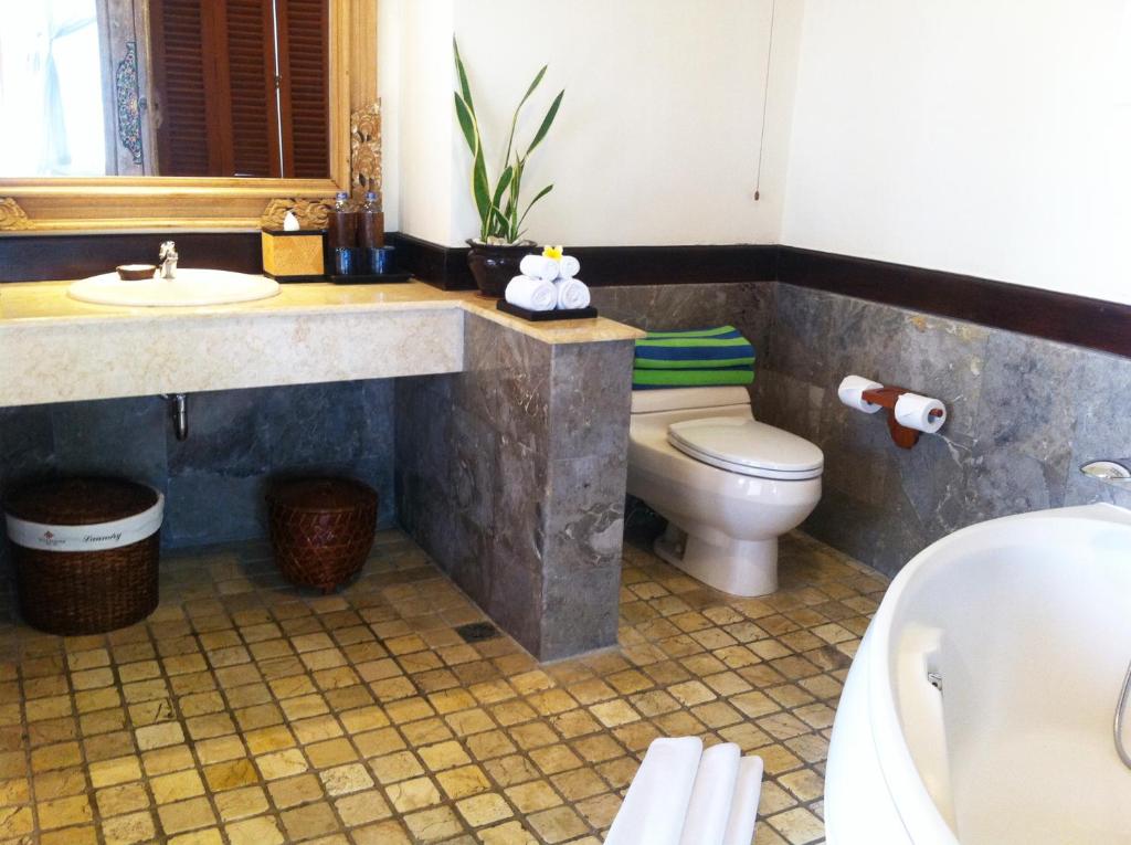 Bathroom with towel at Villa Semana Resort & Spa