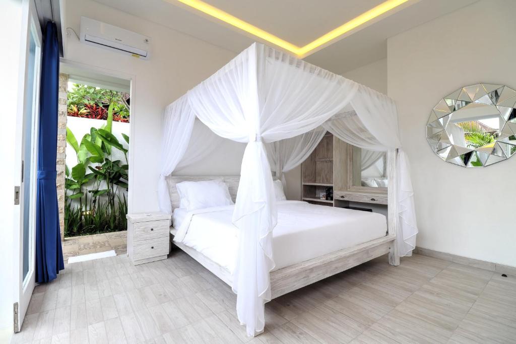 Bedroom with AC at Elite Havens