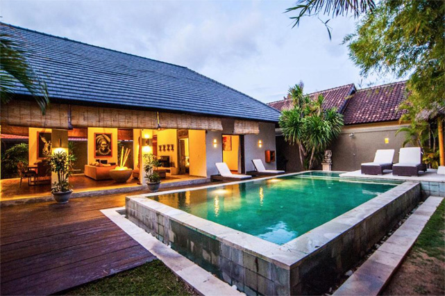 Bali villa with pool at dusk