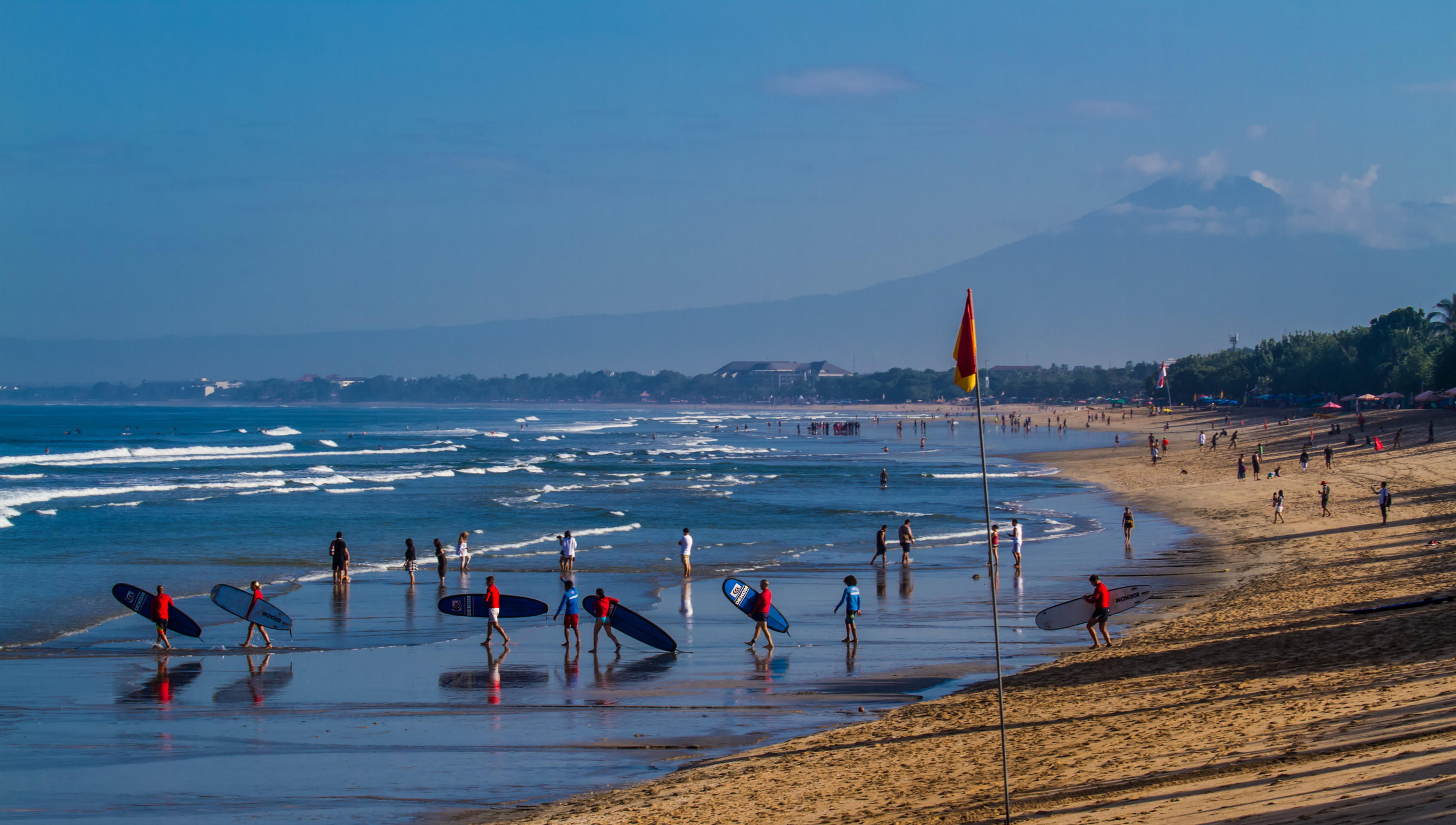 Many people heading to the beach to surf