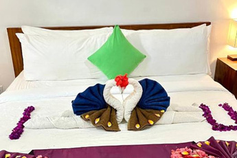 Balinese-style hotel bed with decoration