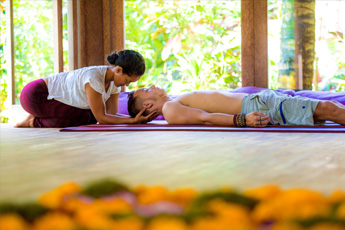 Close-up of flower petals on a massage table