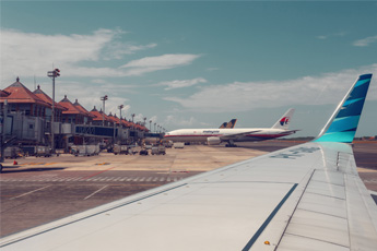 Airplane on runway near Canggu
