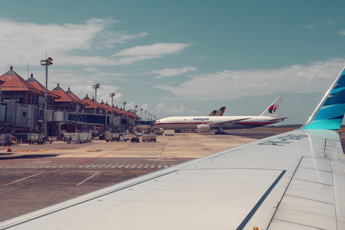 Roadside with cars and airport taxi services