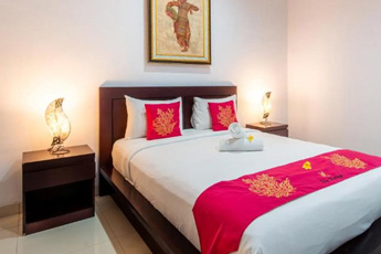 Resort room with colorful pillows