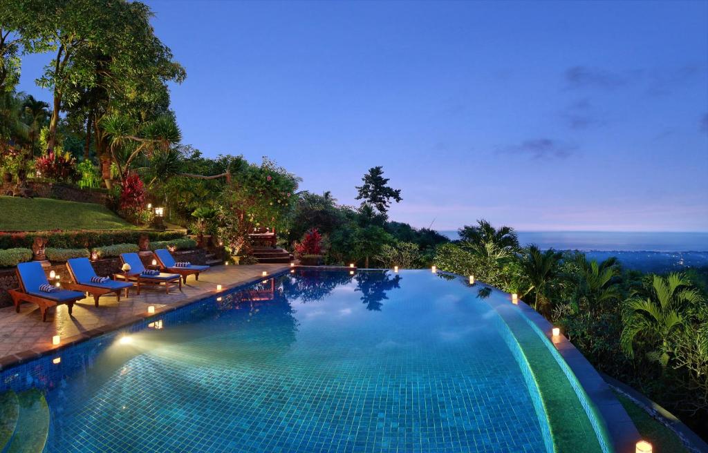 patria villa infinity pool night