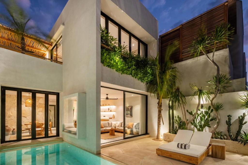 Modern villa with lush greenery and pool